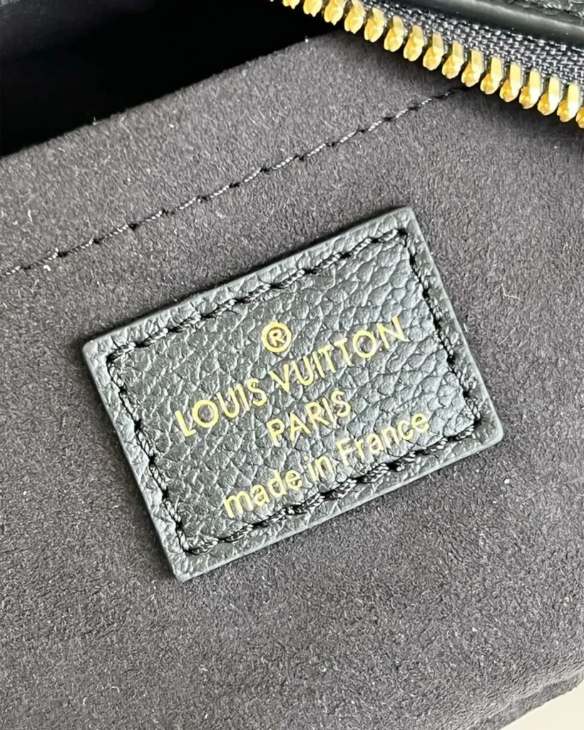 Black Mini Moon-Inspired Crescent Bag — interior label view