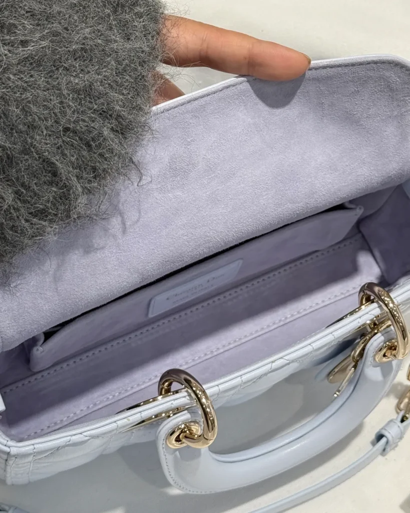 Pale Blue Horizontal Quilted Top Handle Bag — interior view
