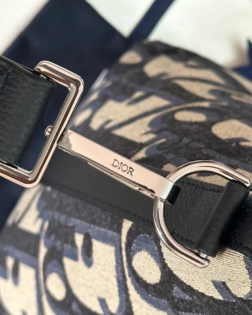 Beige Navy Monogram Zip Travel Tote — strap detail view