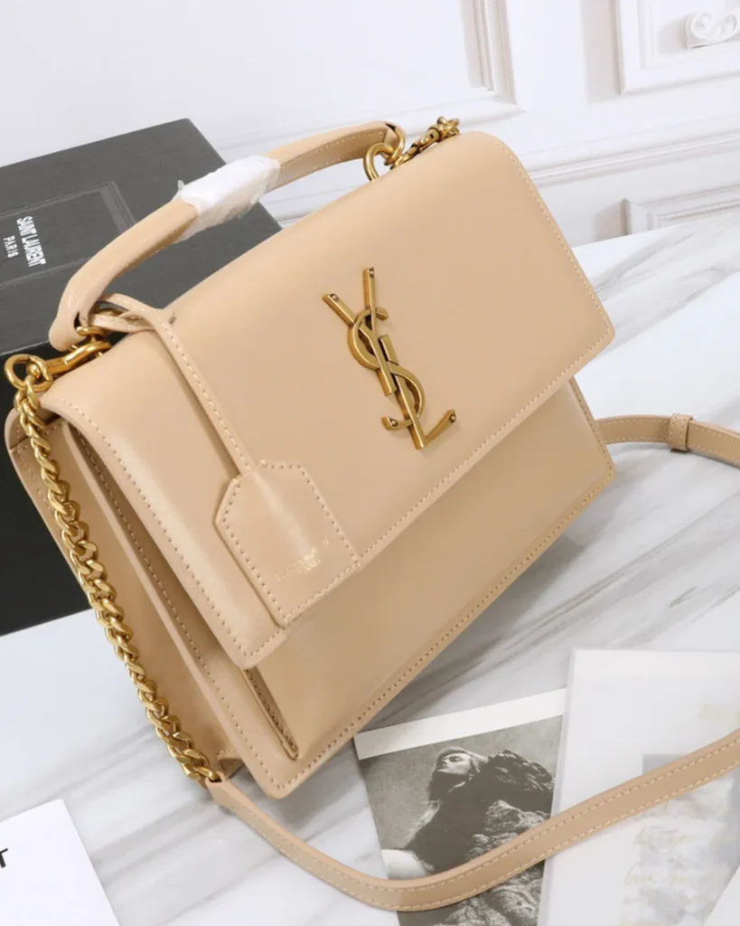 Beige Accordion Chain Flap Bag — angled front view