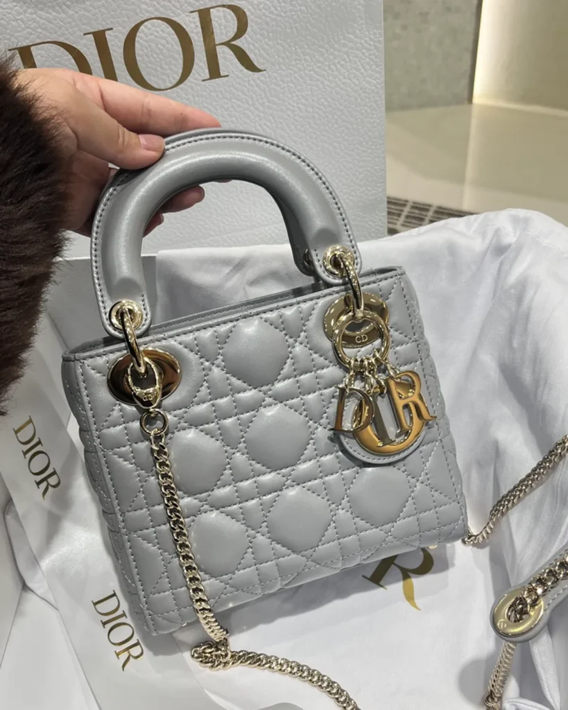 Pearlescent Gray Quilted Top Handle Bag — front view