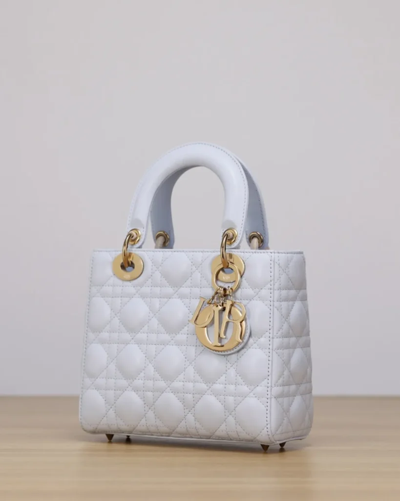 Pale Gray Quilted Top Handle Bag — front without strap view