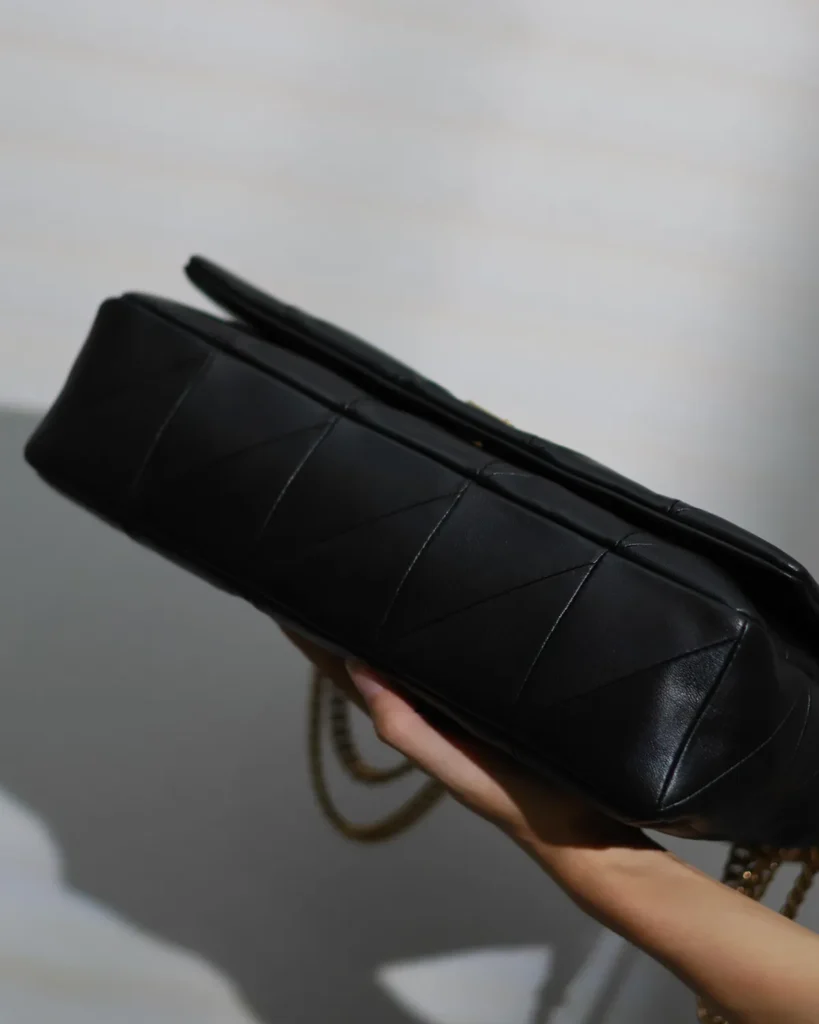 Black Geometric Quilted Flap Bag — base view