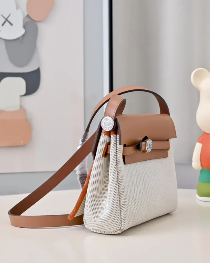 Cream Canvas-Texture Tan Flap Bag — three quarter view