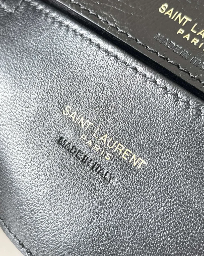 Black Chevron Top-Handle Flap Bag — lining detail view