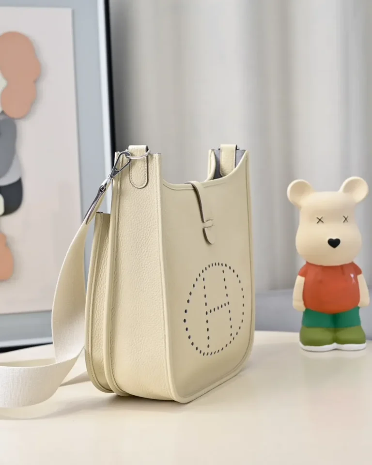 Evelyne-Inspired Ivory Perforated Shoulder Bag, side angle and strap