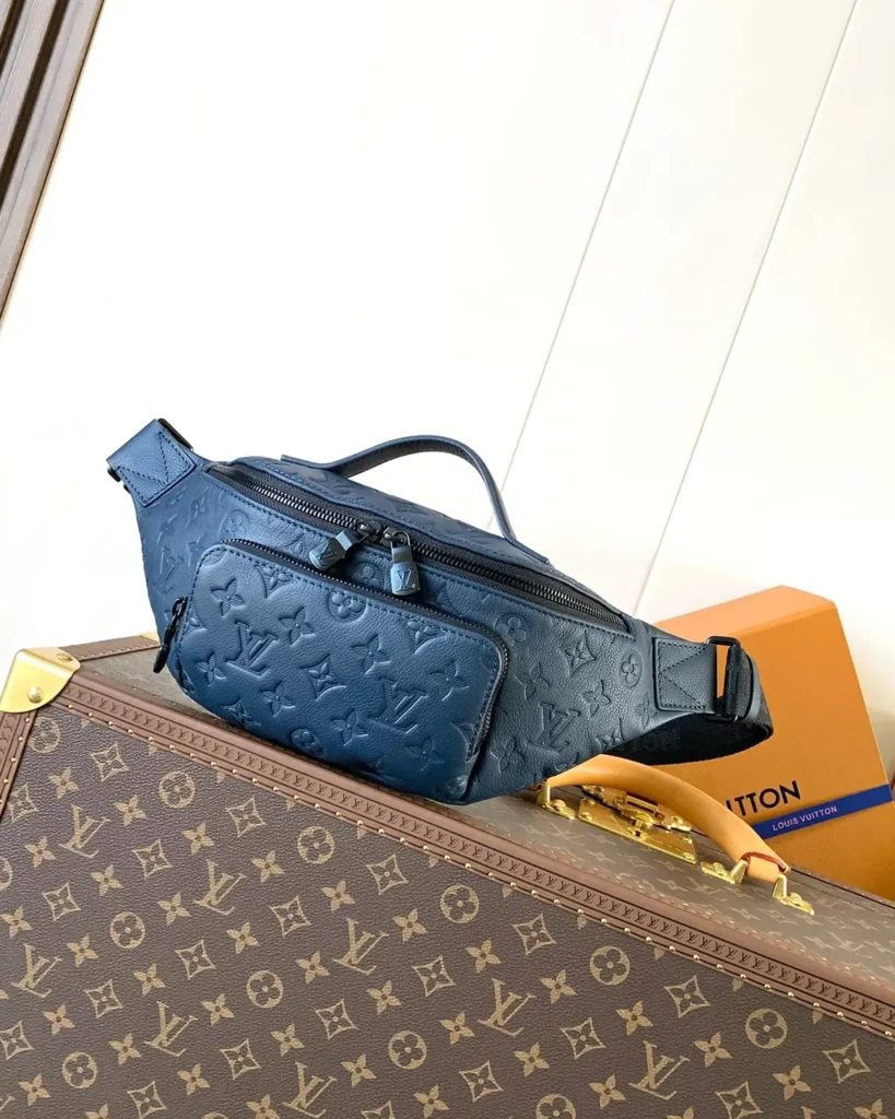 Dark Blue Embossed Monogram Waist Bag — front view