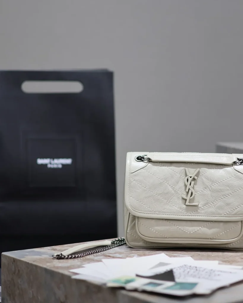 Ivory Crinkled Chevron Chain Bag — front detail view