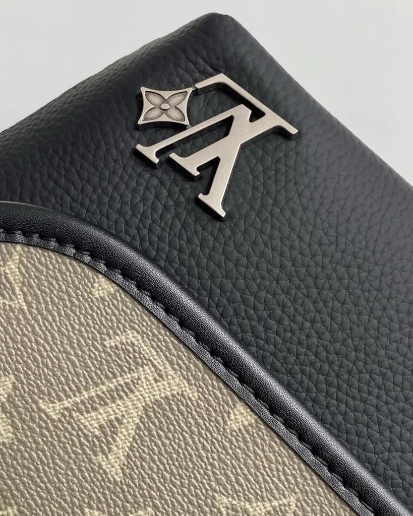 Black and Olive Monogram Flap Crossbody Bag — emblem view