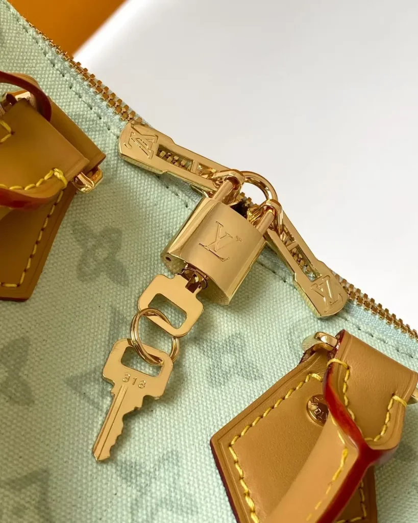 Pale Green Monogram Boston Bag — zipper padlock view