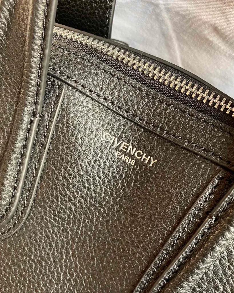 Black Rounded Twin-Handle Satchel — interior detail