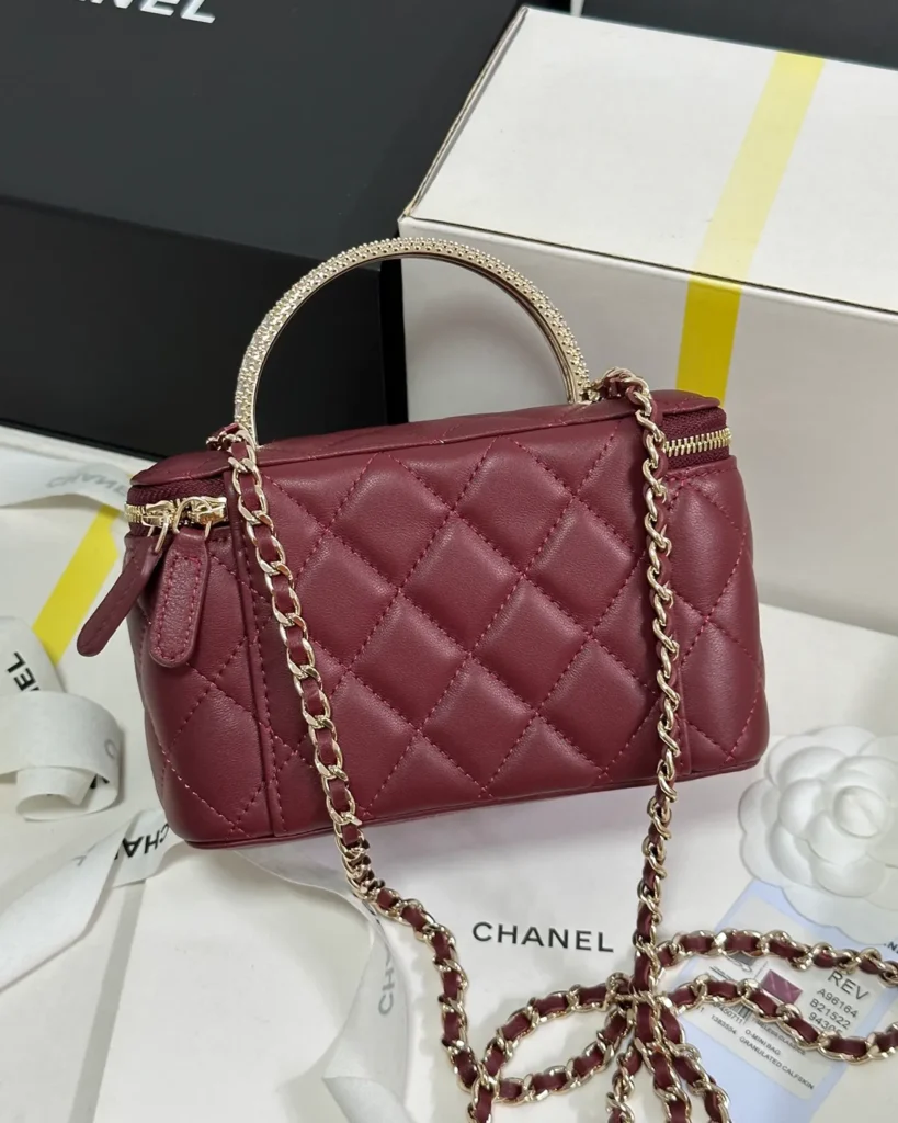 Burgundy Quilted Ornamental-Handle Vanity Bag — rear view