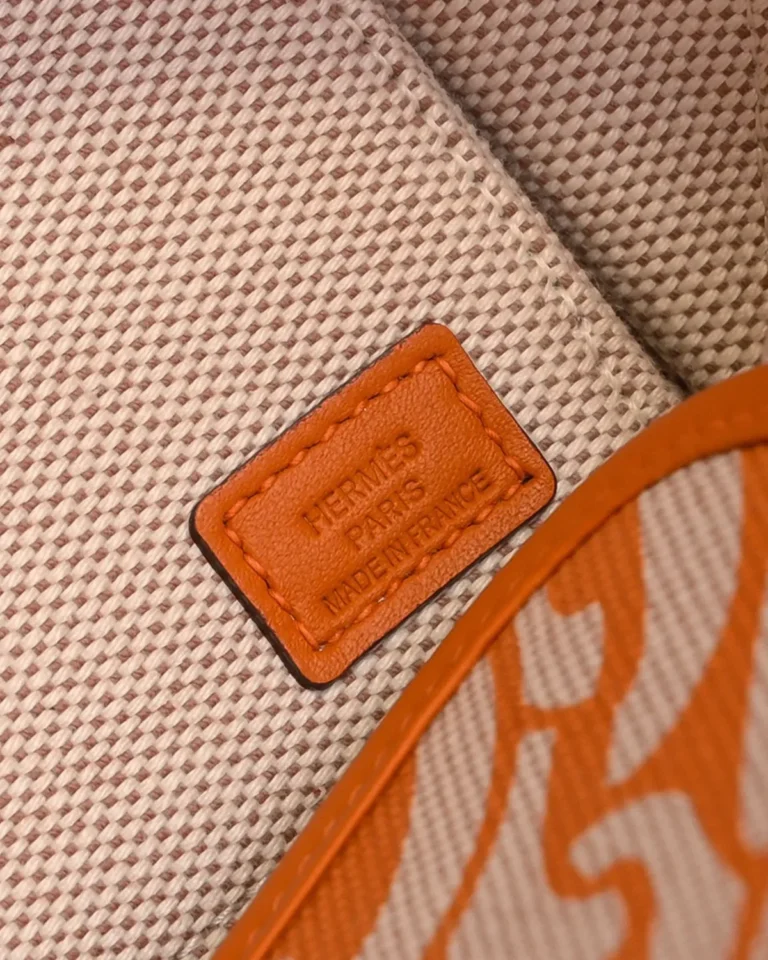 Steeple-Inspired Orange Patterned Canvas Tote, inner label view