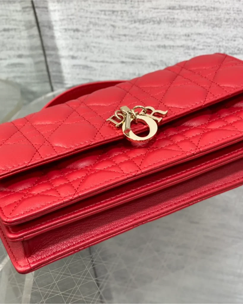 Red Quilted Top Handle Flap Bag — flap detail view
