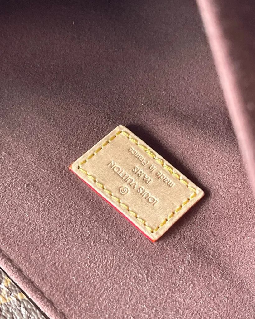 Brown Monogram Flap Satchel — interior label view