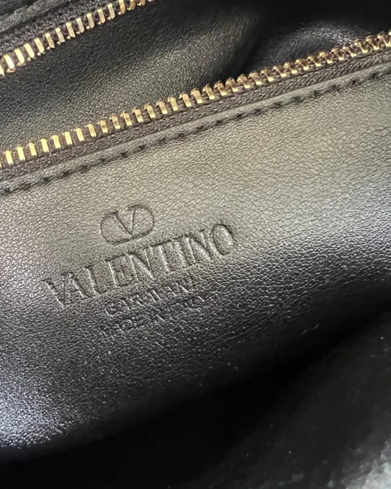 Black and Tan V-Panel Zip Top-Handle Bag — interior label view