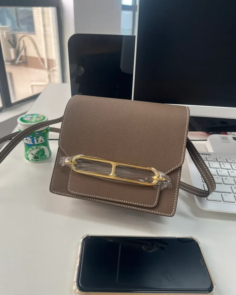 Taupe Link-Clasp Shoulder Bag — angled front view