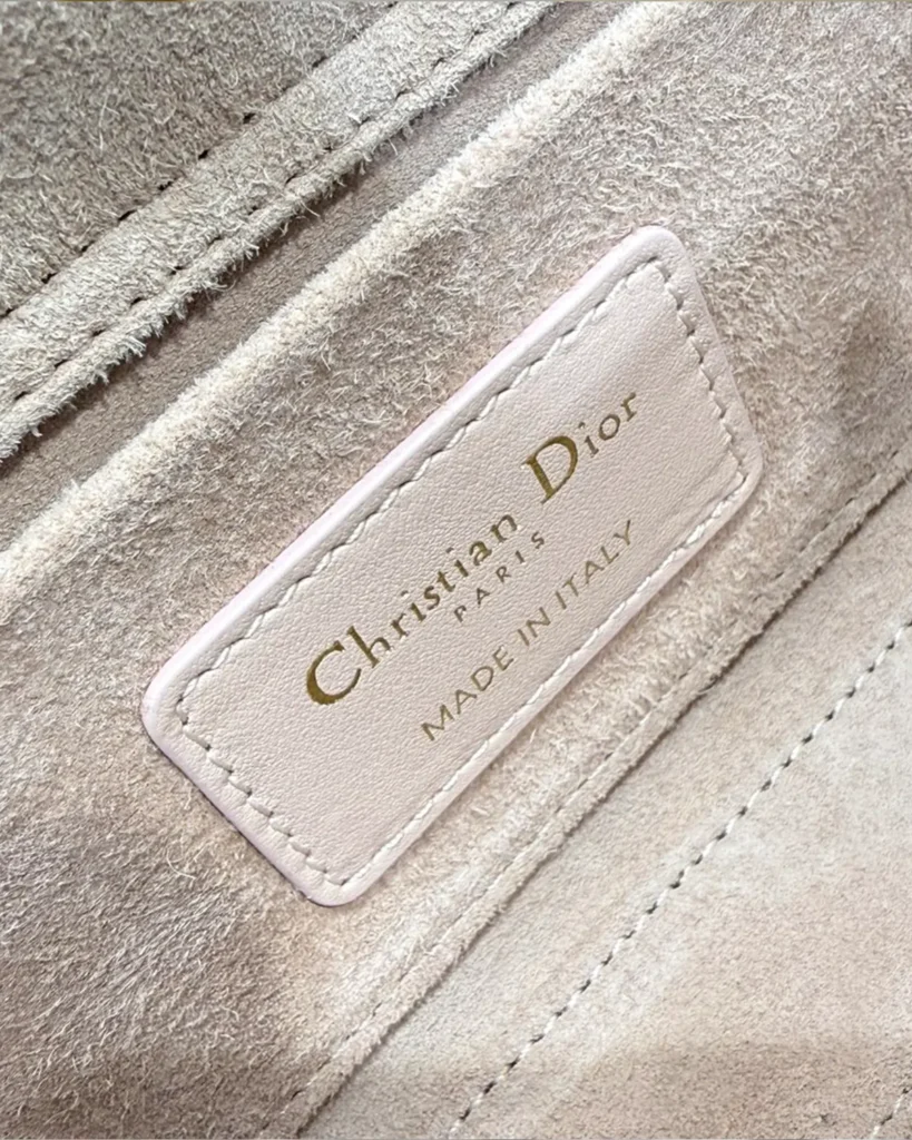 Powder Pink Quilted East West Handbag — interior label view