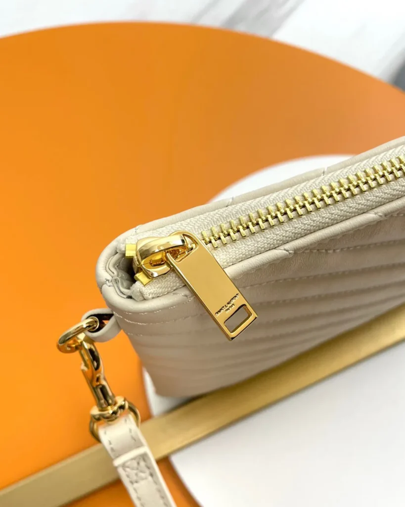 Ivory Chevron Zip Wristlet Pouch — zipper detail view