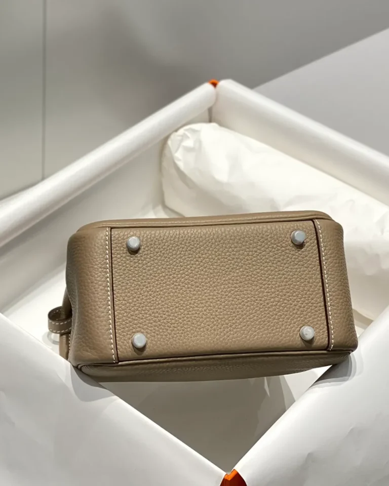 Lindy-Inspired Mini Taupe Crossbody Bag, base and four metal feet