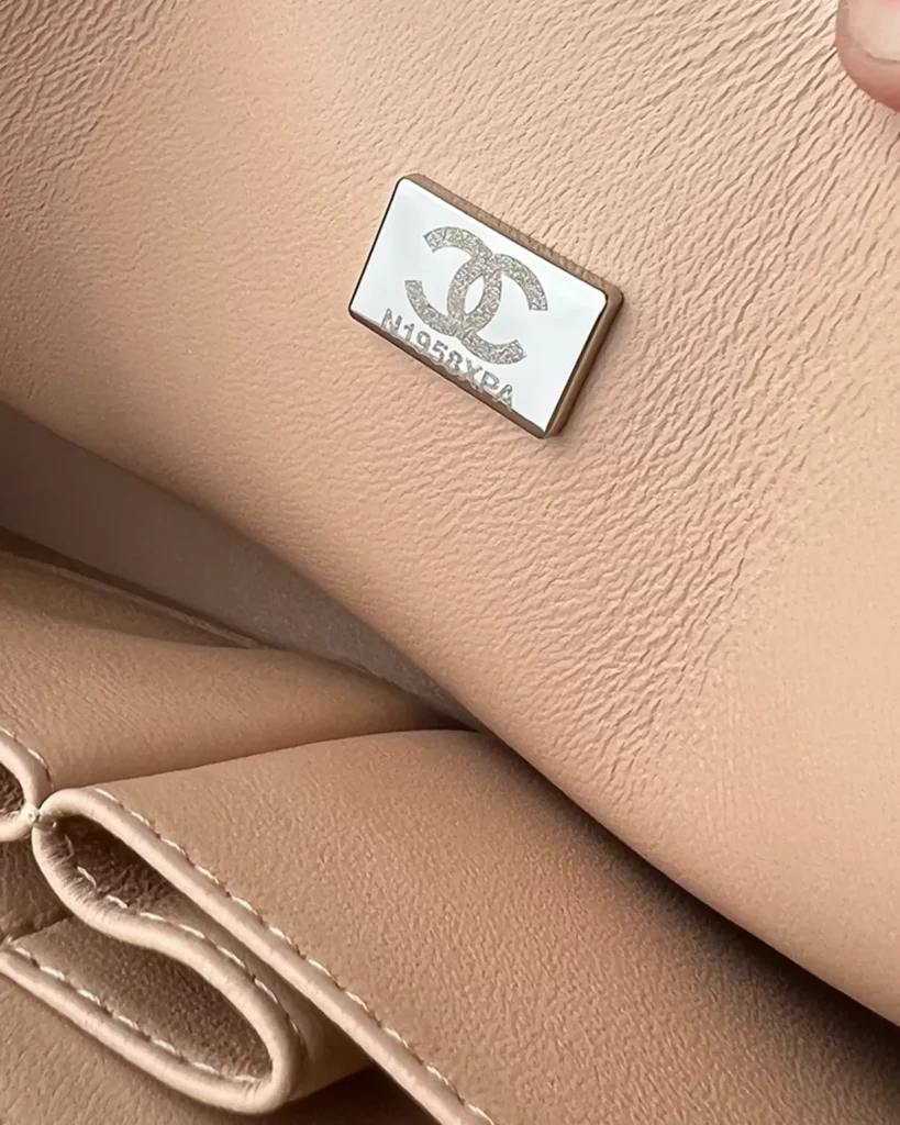 Beige Quilted Chain Flap Bag — interior plate view
