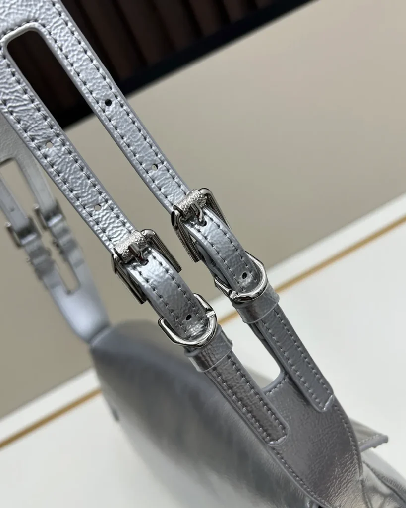 Silver Metallic Buckle Shoulder Bag — strap detail