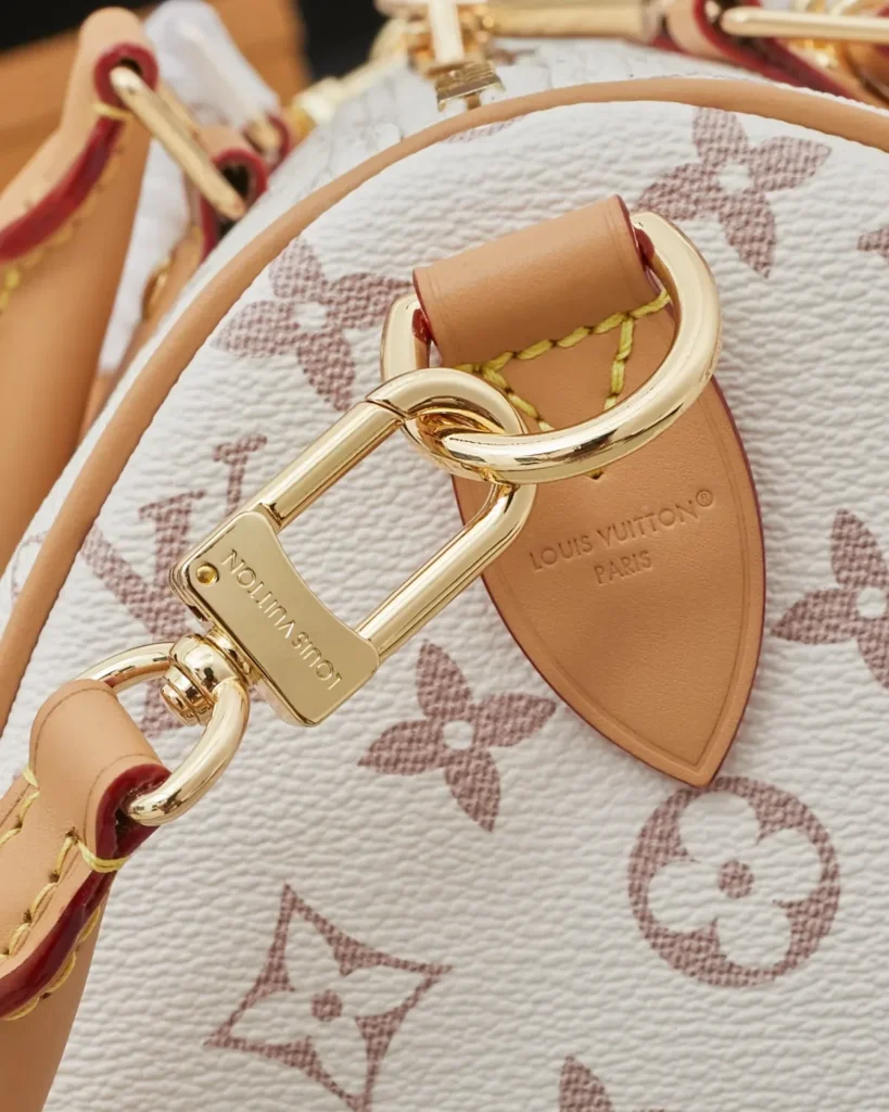 Cream Monogram Top-Handle Bag with Colorful Charms — strap clip view