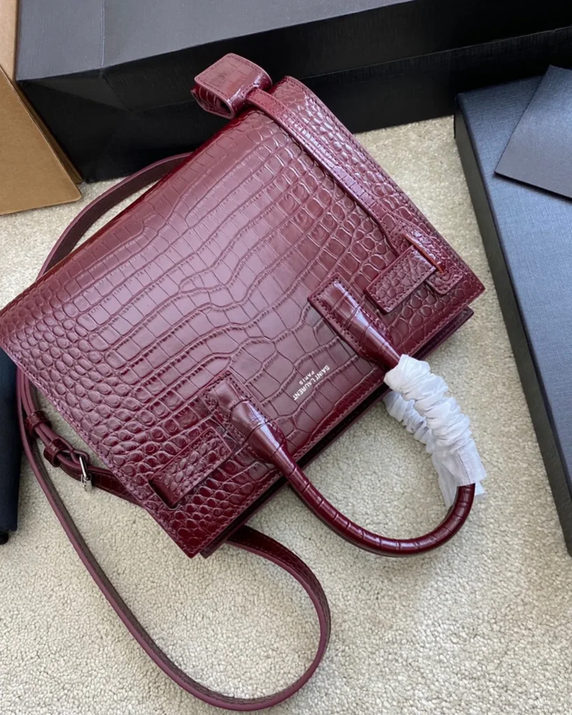 Burgundy Embossed Accordion Tote — angled front view