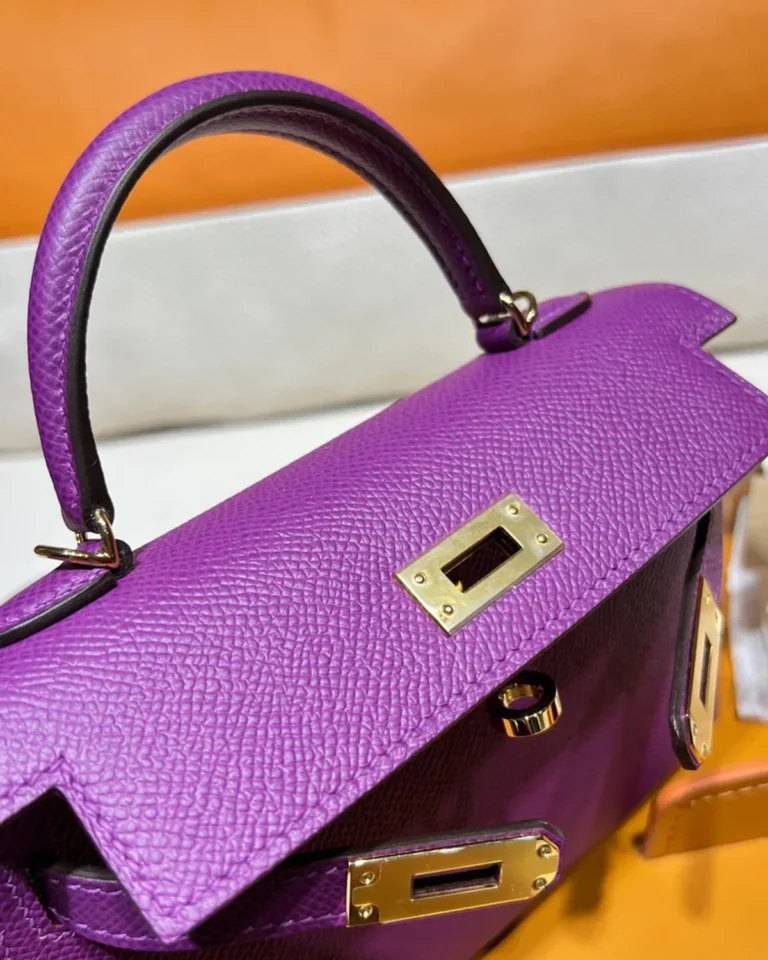 Kelly-Inspired Mini Anemone Purple Top-Handle Bag, arched handle and flap close-up