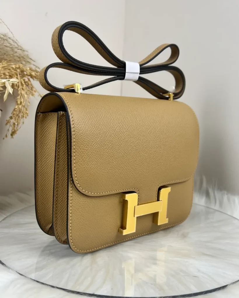 Kraft Tan constance-inspired mini 18 bag, front angle view