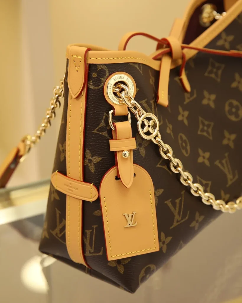 Brown Monogram Bow Chain Shoulder Bag — tag view