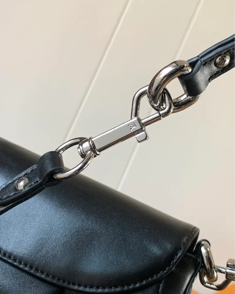 Black Gathered Flap Shoulder Bag — strap clip view