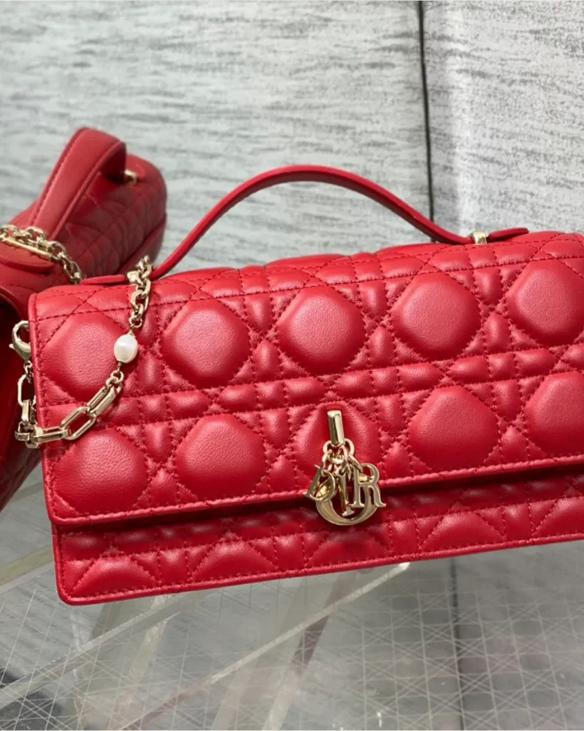 Red Quilted Top Handle Flap Bag — front view