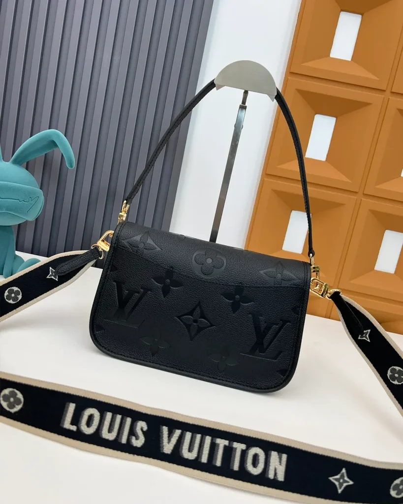 Black Embossed-Monogram Buckle Satchel — rear view