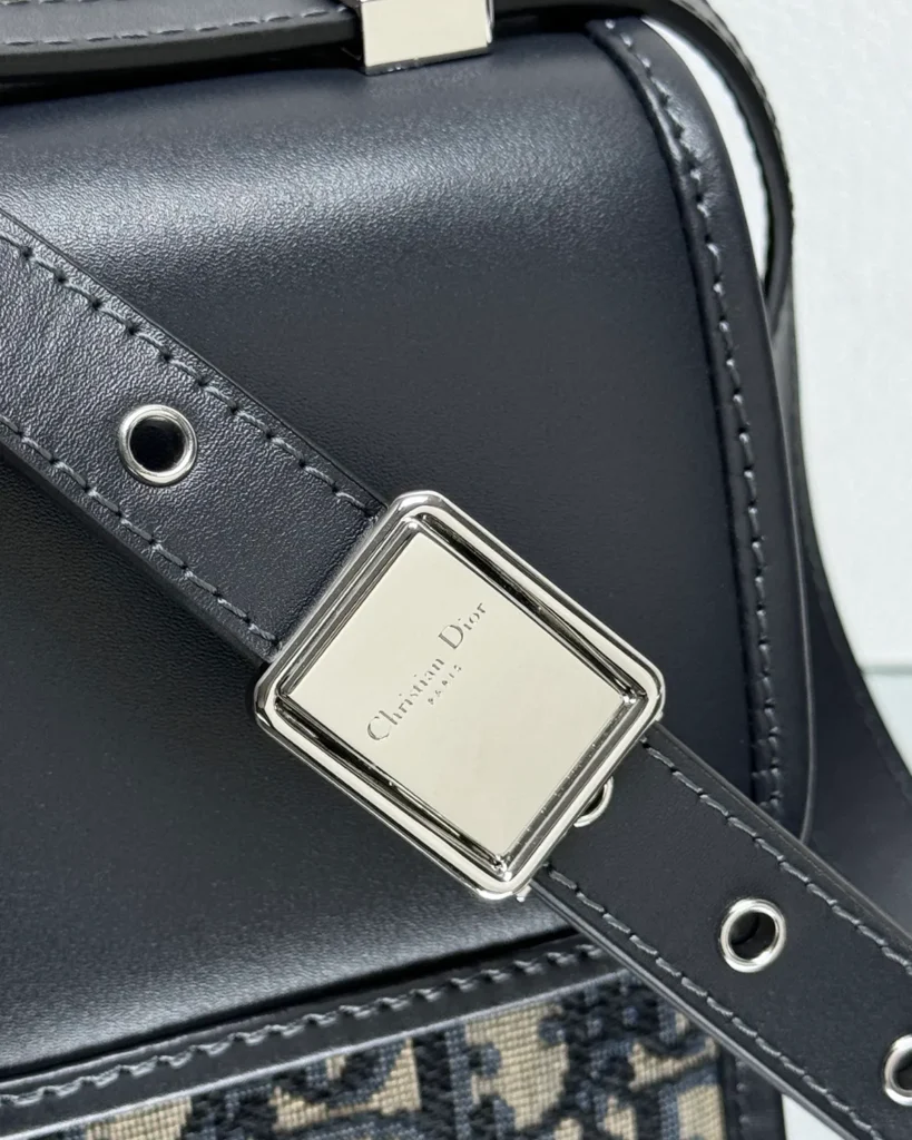 Navy Monogram Box Flap Bag — buckle detail view
