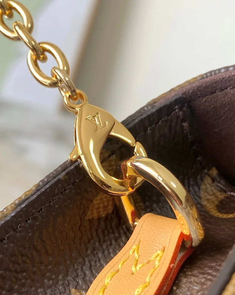 Brown Monogram Lily-Inspired Chain Wallet — chain clip detail view