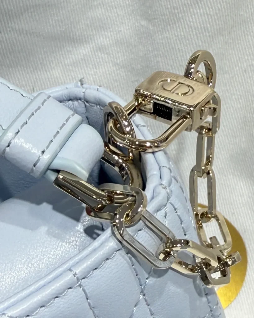 Soft Blue Quilted Chain Handbag — chain detail view
