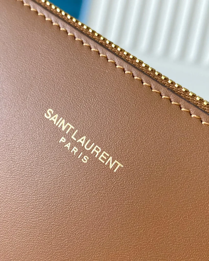 Tan Curved-Top Bucket Bag — interior detail view