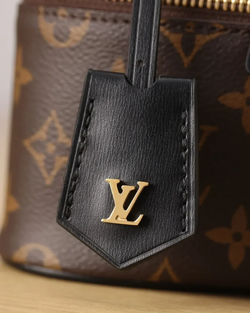 Brown Monogram Vanity Case with Padlock — tag view