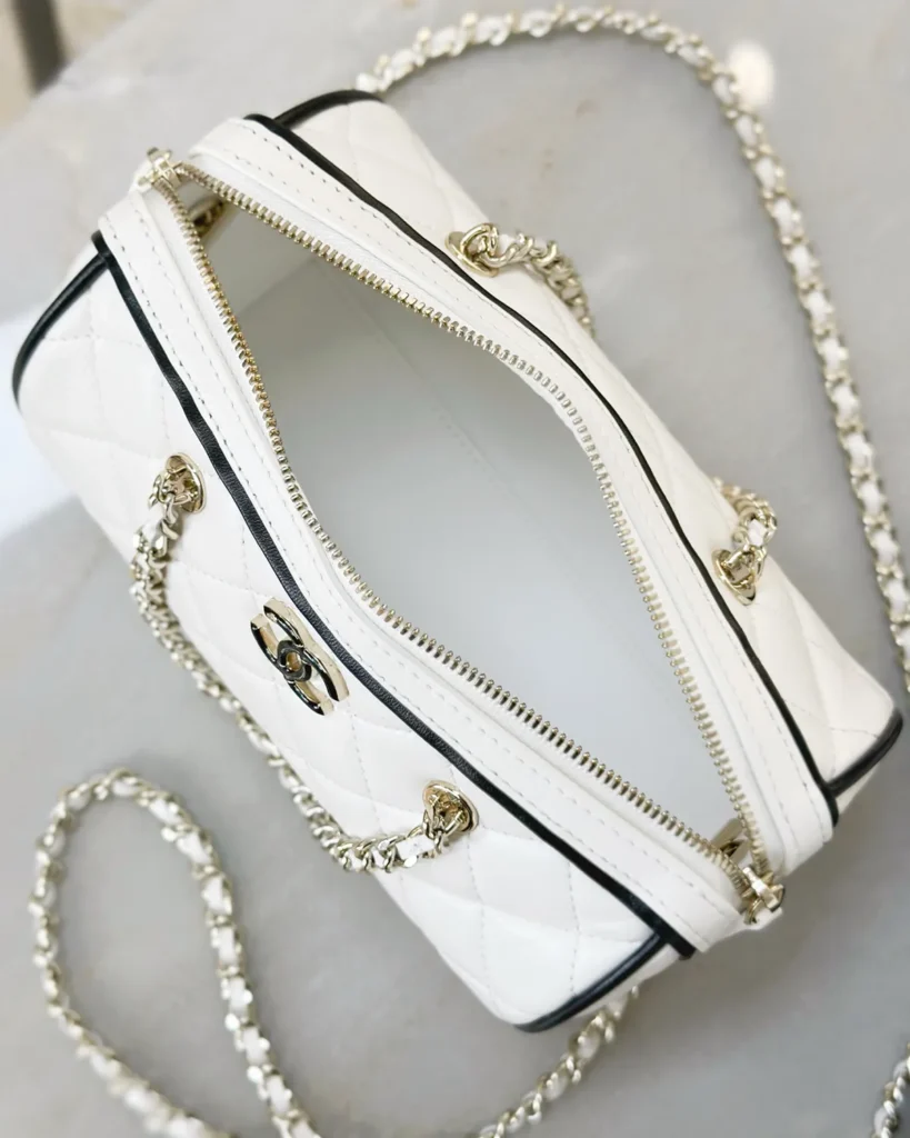White and Black Quilted Chain Bowler Bag — open top view