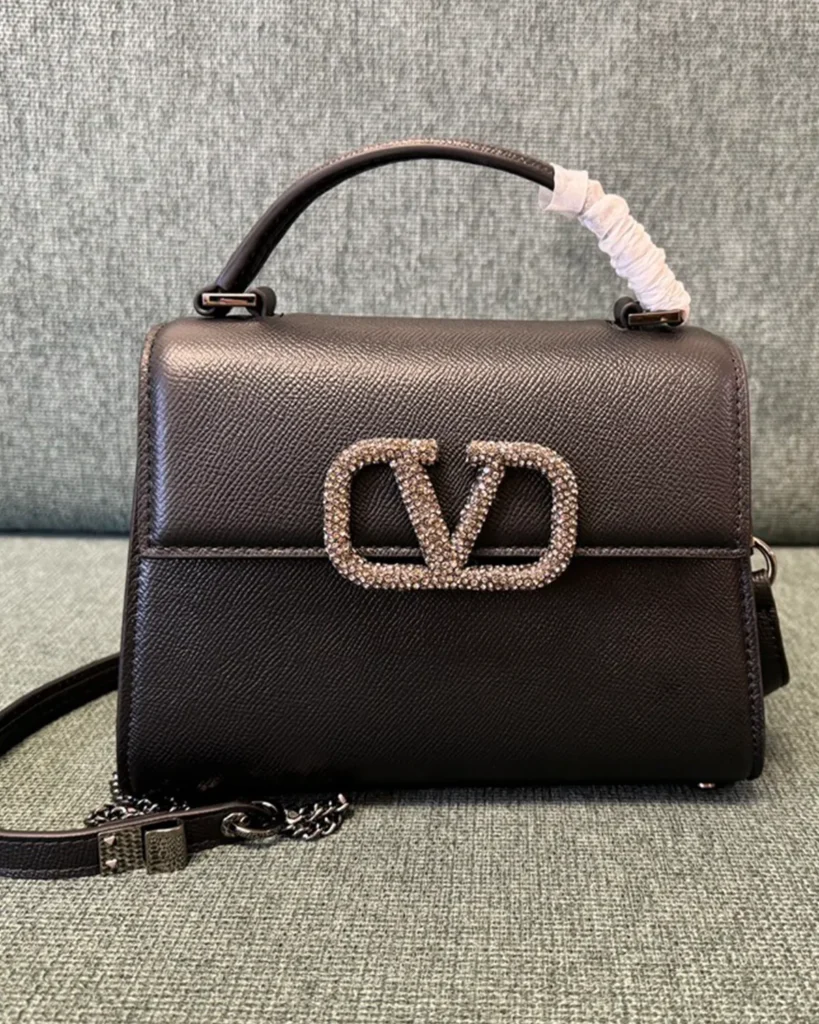 Dark Brown Embellished Emblem Top-Handle Bag — front view