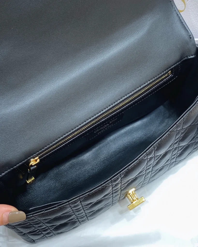 Black Quilted Flap Bag with Gold Tone Clasp — interior view
