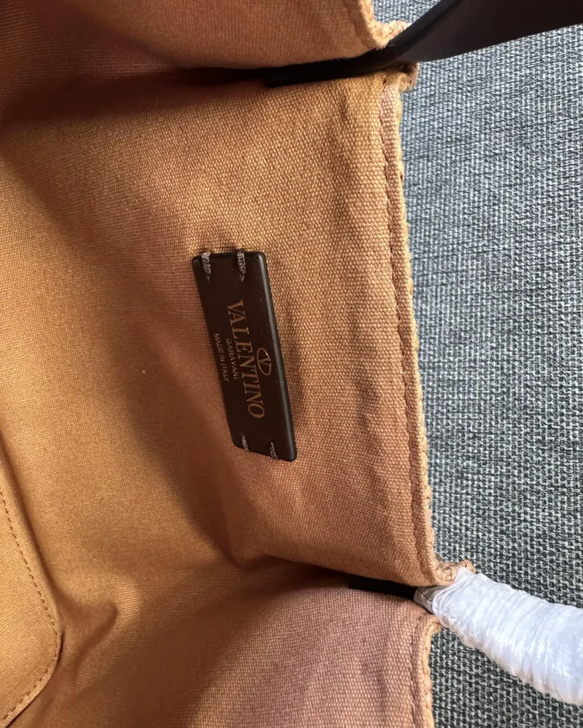 Tan Woven Top-Handle Tote — interior detail view