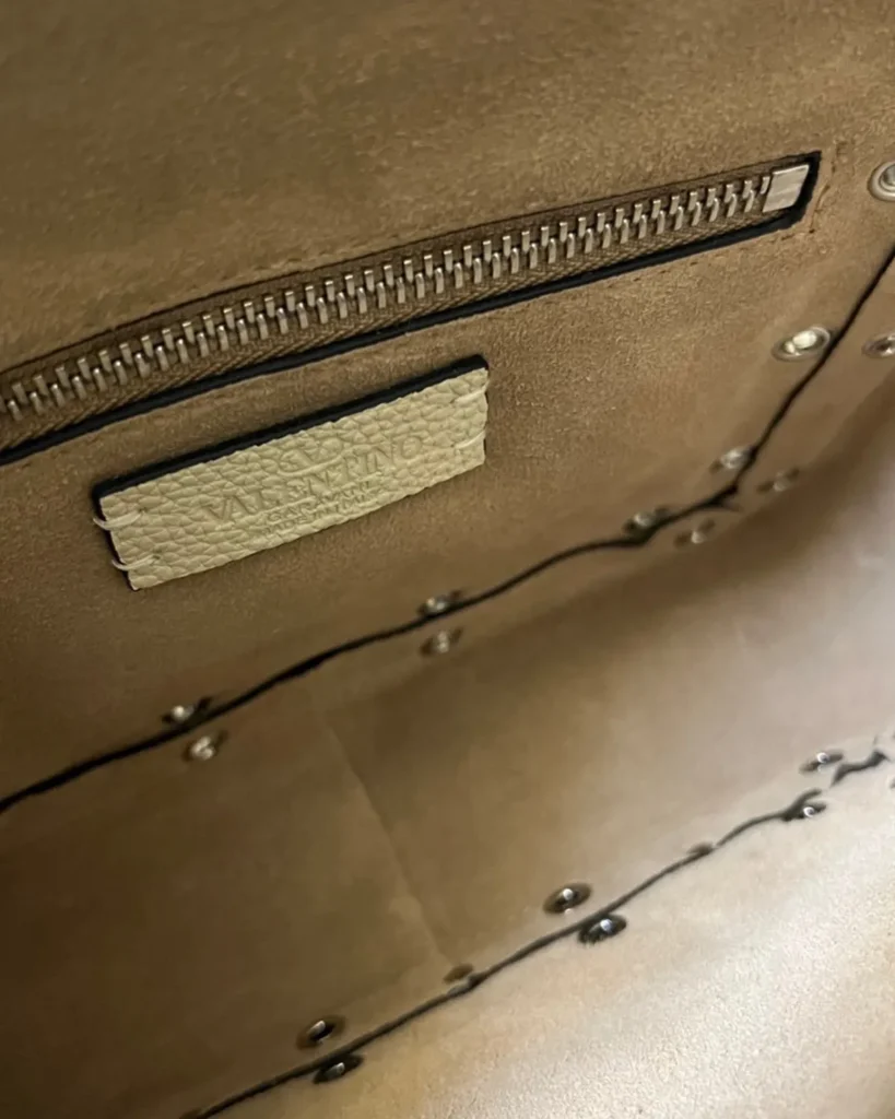 Cream Studded Long-Handle Tote — interior pocket view
