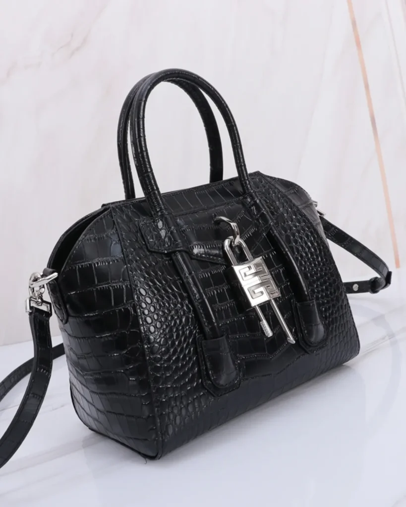 Black Scale-Texture Padlock Satchel — angled front