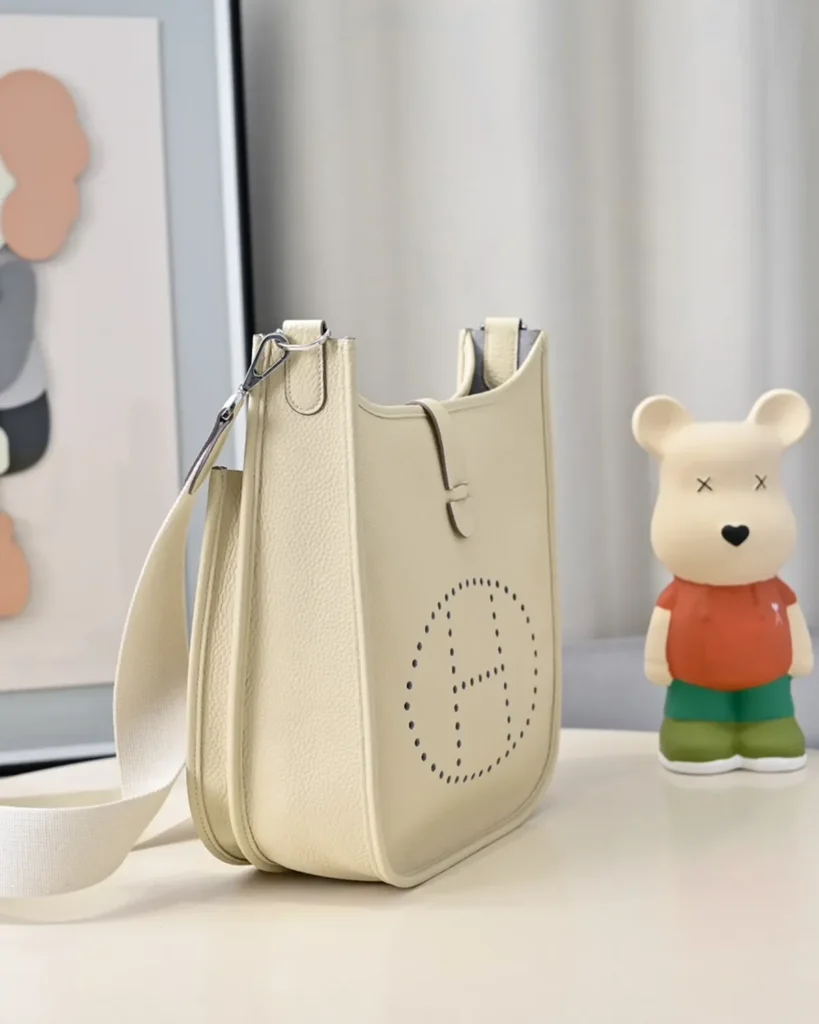 Evelyne-Inspired Ivory Perforated Shoulder Bag, side angle and strap