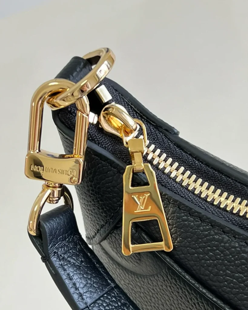 Black Mini Moon-Inspired Crescent Bag — zipper clip detail view