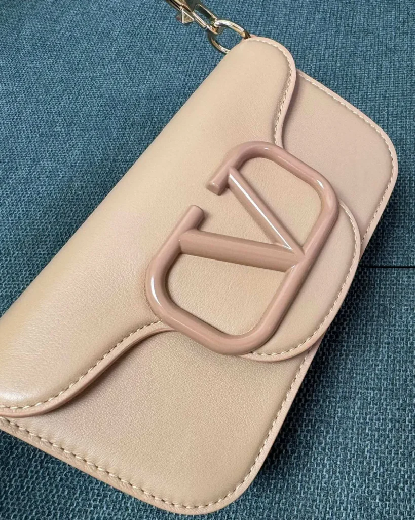 Beige Tonal-Ornament Flap Shoulder Bag — ornament detail view