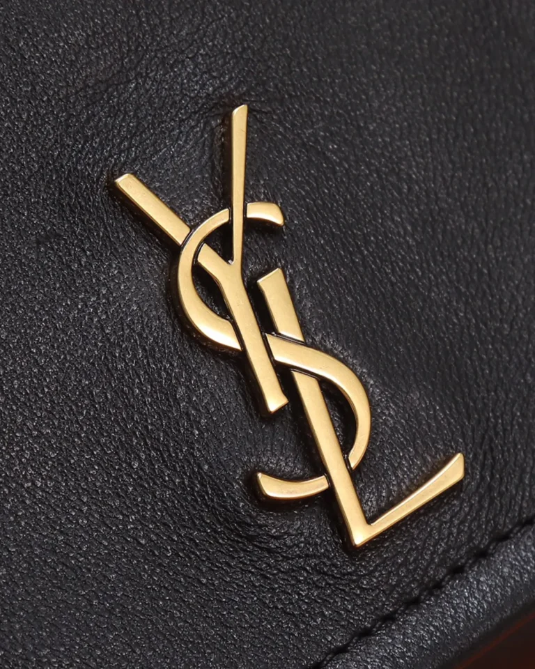 Black Diamond-Quilted Chain Flap Bag — logo detail view