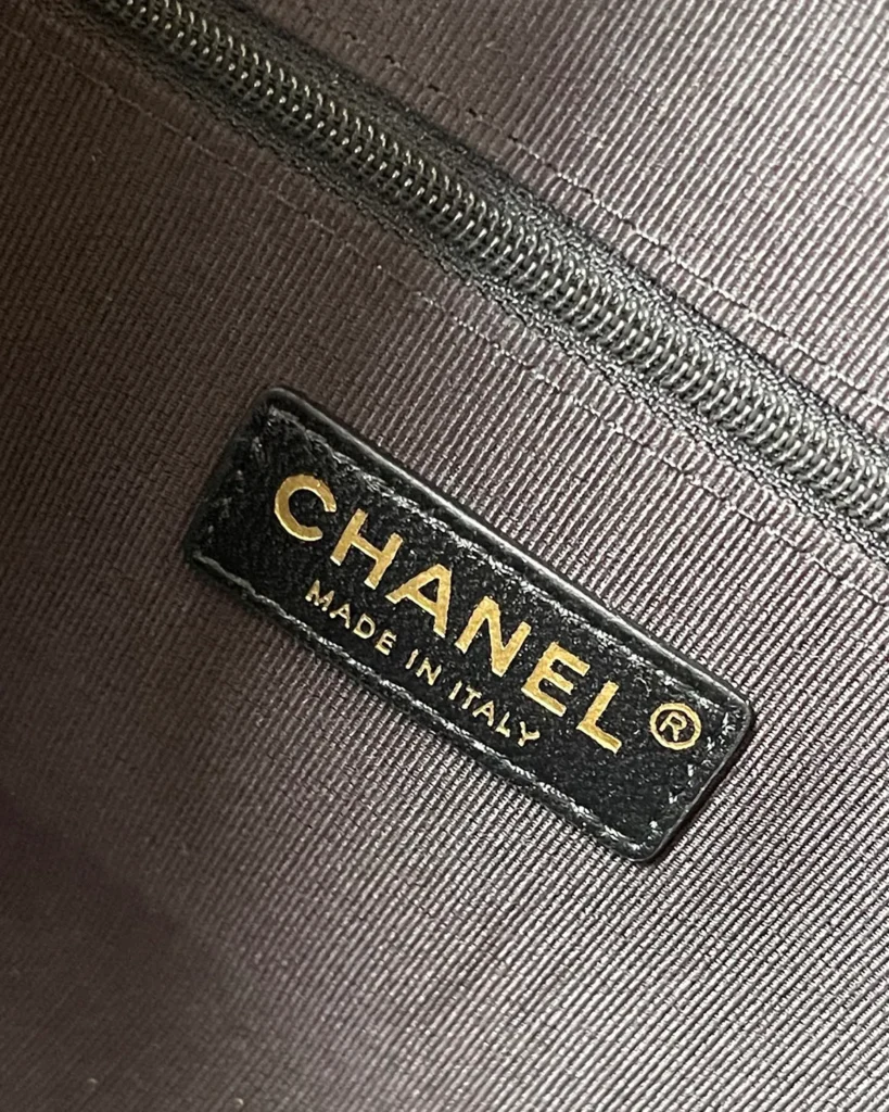 Tan and Black Quilted Chain Tote — interior label view